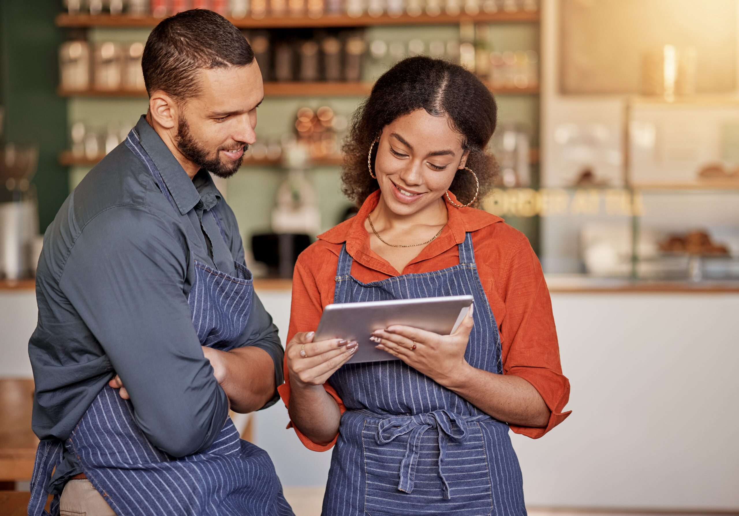 Restaurant employees using a tablet